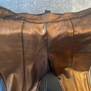 Plus size metallics pants. Has great stretch and easy to slide on. Worn once.